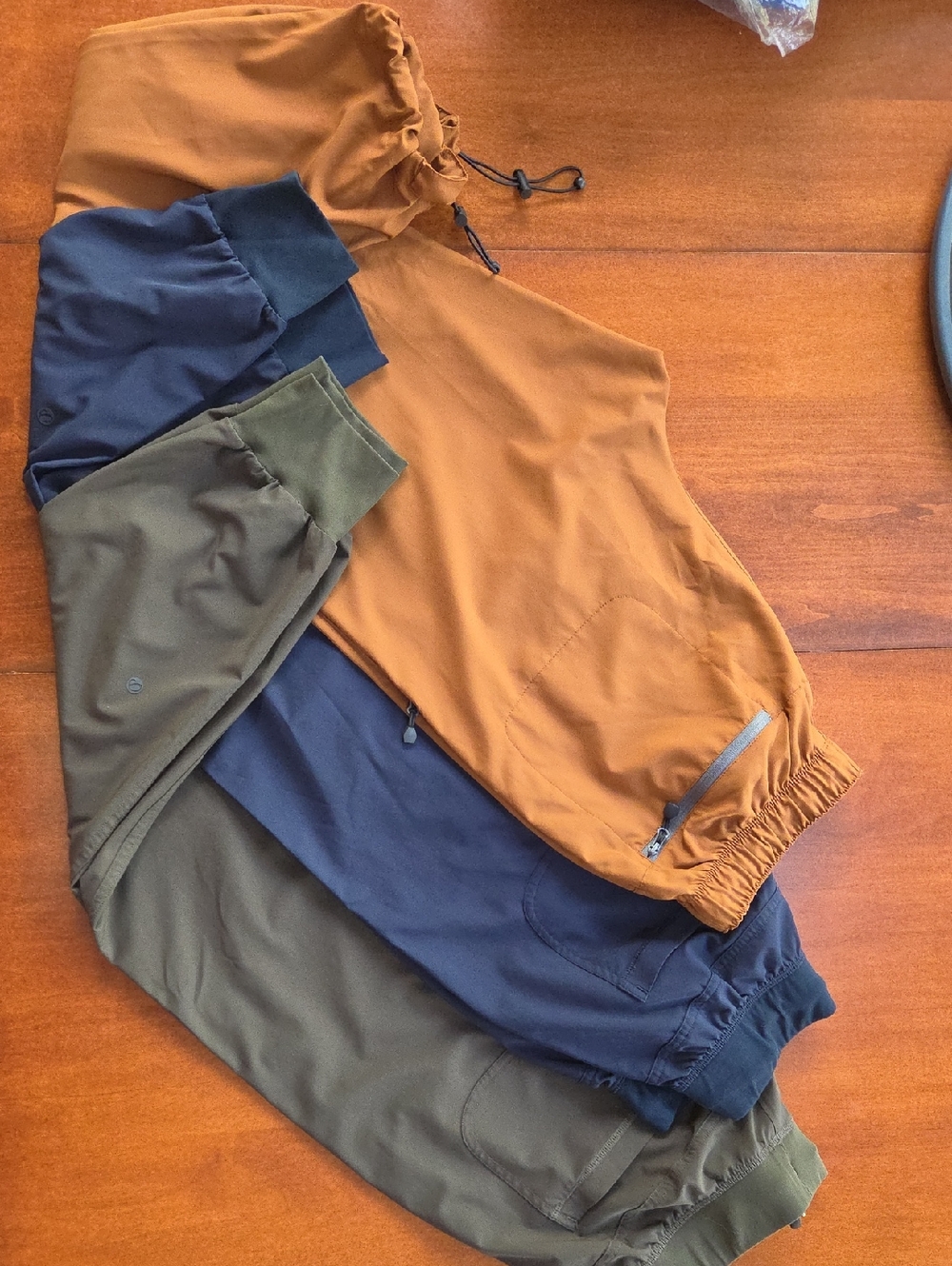 Three Casual Drawstring Joggers in Terra Cotta, Navy, and Olive